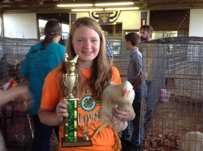 Bailey Stevens, Fayette, MO Daughter of Ted Stevens received Grand Champion Meat pen of chickens and Overall Grand Champion Poultry Exhibit with the same Cornish Cross chicks at the Howard County Fair in Fayette, MO on Tuesday June 24. The chicks were