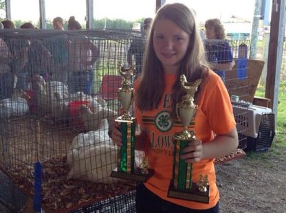 Bailey Stevens, Fayette, MO Daughter of Ted Stevens received Grand Champion Meat pen of chickens and Overall Grand Champion Poultry Exhibit with the same Cornish Cross chicks at the Howard County Fair in Fayette, MO on Tuesday June 24. The chicks were