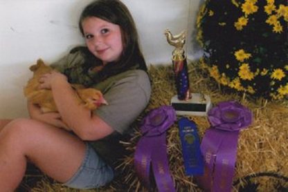2012 Runner UP, Picture of my daughter with her show winning Cackle Hatchery® Buff Orpington, Best of Show (Jr), Grand Champion (Jr) and 1st place (over all) 2012 Green County Arkansas Fair