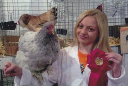 Our daughter, Kennedy's first year showing poultry. She received 2nd place in her Asiatic Class with her Splash Cochin Hen.