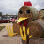 chicken sculpture made from hay bales