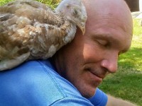 Man with Chicken on shoulder