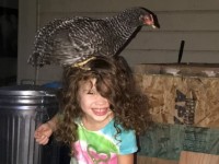 Girl with Bird on her head