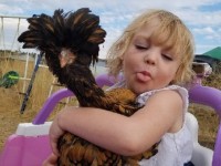 Girl holding polish chicken