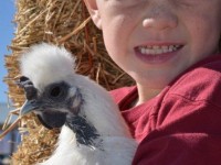 Small Child with White Bird