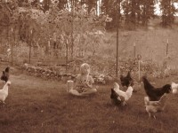 Girl Blowing Bubbles with Chickens
