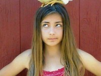Girl with Chicken on her Head