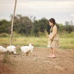 girl with chickens