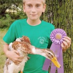 Boy with chicken