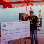 First Place Winner of Egg Eating Contest Molly with Jeff Check