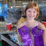 Child with ribbons