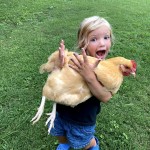Child Holding Chicken