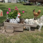 Chicken on garden decoration.