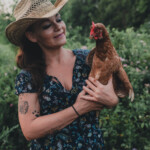 Justin Heck - Lady Holding Chicken
