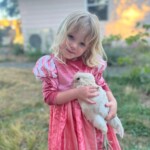 artistic contest girl holding chicken
